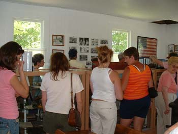 029 - Visitors viewing artifacts