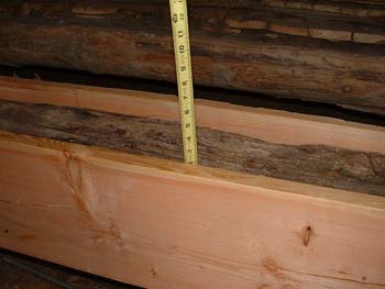 064 - Shows 2 inch sag in some joists