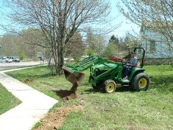 045 - Holes being filled with topsoil