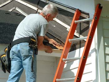 054   -First wooden shingle applied