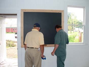 078 - The first blackboard was mounted