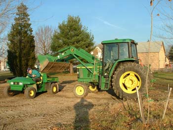 107 - Hauling top soil for backfilling