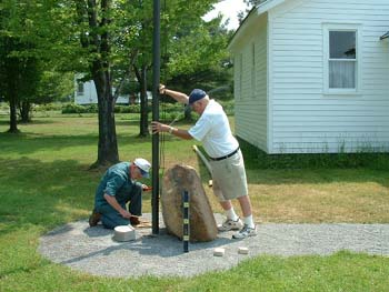 153 - The flagpole being installed