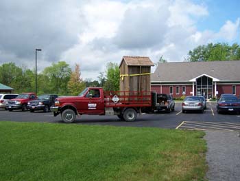 207 - Outhouse arrives at Schoolhouse site