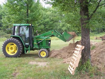 255 - More topsoil arrived to refine back lawn