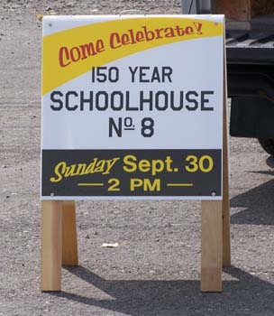 257 - Sandwich board advertising celebration of the 150th