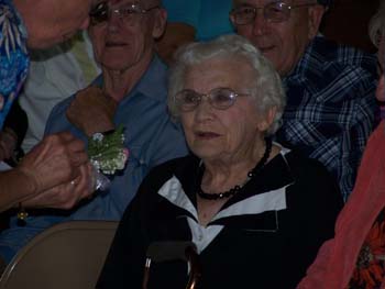 287 - Mrs Falk received a corsage
